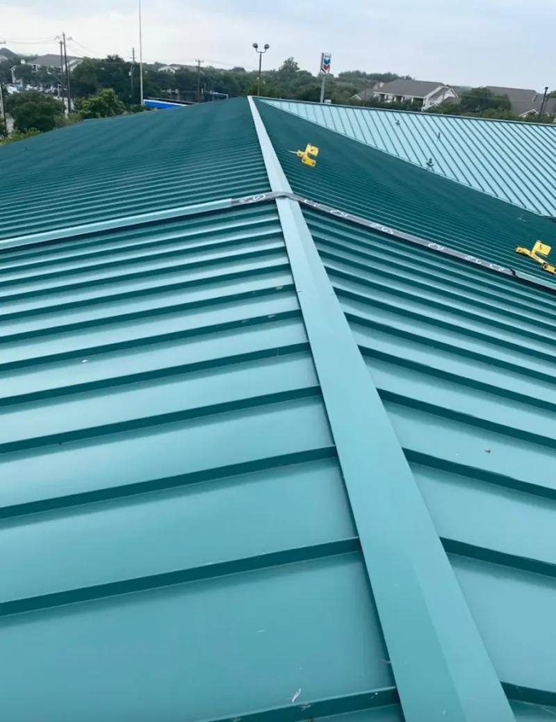 Green commercial metal roof ridge and valley for Metal Roof Repair in Carmichael